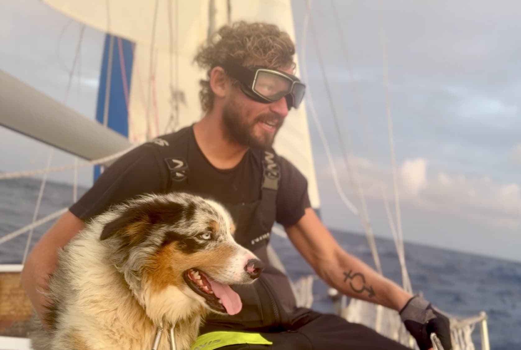Kimmer O'Reilly and Casper sailing together in open ocean during an Atlantic crossing